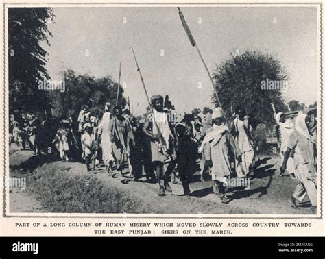 Part of a long column of refugee Sikhs marching across the East Punjab ...