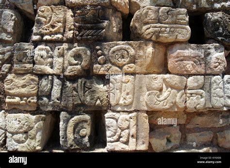 Sculptures on the wall of pyramid in Copan, Honduras Stock Photo - Alamy