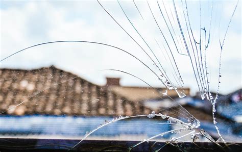 Close-up on Cracked Glass in Window · Free Stock Photo