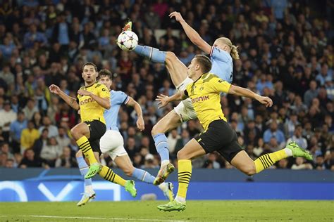 Haaland's spectacular goal earns City 2-1 win over Dortmund | AP News