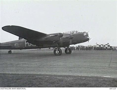 WADDINGTON, ENGLAND. 1944-04-18. LANCASTER BOMBER AIRCRAFT OF NO. 467 SQUADRON RAAF TAKING OFF ...