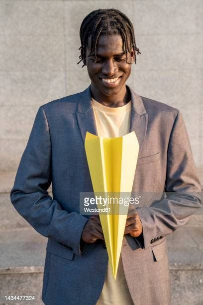 Yellow Paper Plane Photos and Premium High Res Pictures - Getty Images