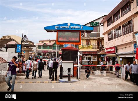 Tourists at the entrance of a shopping mall, Mall Road, Mussoorie Stock ...