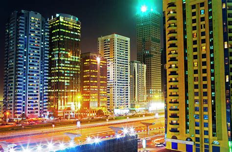 Skyscrapers On Sheikh Zayed Road, Night by Scott E Barbour