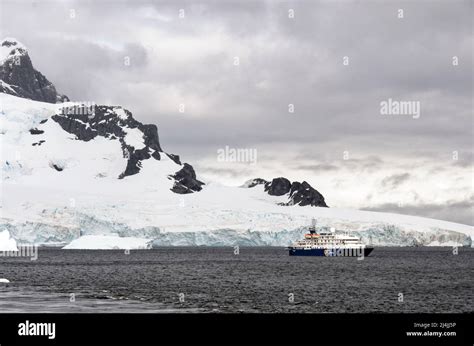 Exploring Antarctica - Quark Expeditions Sea Spirit Cruise Ship sailing among the Icebergs ...