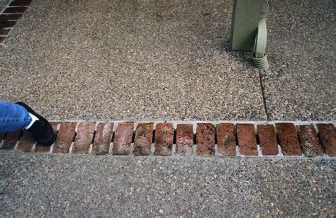 a person walking up some steps with their feet on the ground