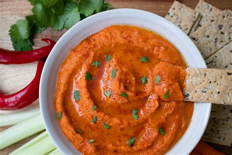 Spicy Roasted Red Pepper Hummus - The Delicious plate