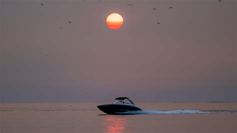 Download wallpaper 3840x2160 boat, sun, sunset, glare, birds 4k uhd 16:9 hd background