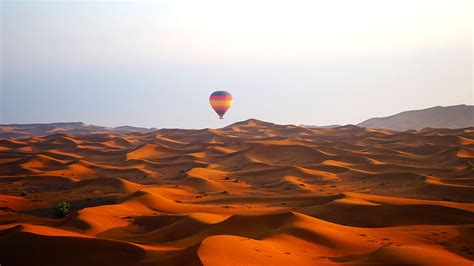 Desert Safari Dubai | Camel Rides, Hot Air Balloons & Sand Dune Surfing!