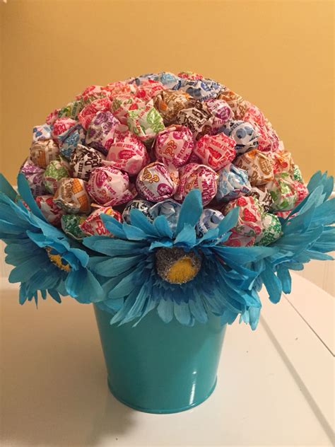 Dum Dum bouquet | Candy crafts, Candy bouquet, Coil pots