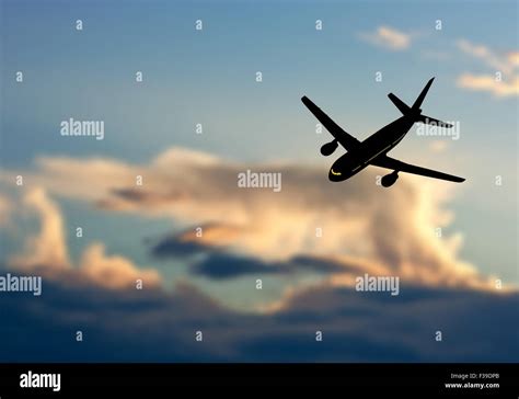 Passenger jet airplane silhouette in blurred sunset sky. Vector illustration Stock Vector Image ...