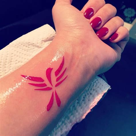 Small Phoenix Pink Tattoo | Small phoenix tattoos, Pink tattoo ink, Phoenix tattoo design