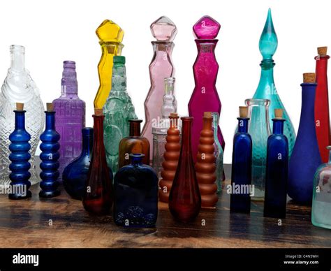 A Collection Of Glass Bottles All Different Shapes, Sizes And Colours Stock Photo - Alamy