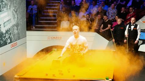 World Snooker Championship protestor storms table and covers it in ...