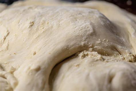 Premium AI Image | Closeup of pizza dough showing off its yeasty flavor ...