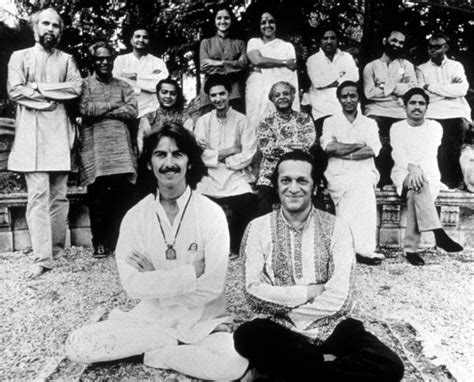 'George Harrison and Ravi Shankar pose in front of musicians from the ...