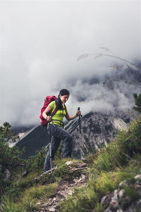 A female hiker on a hike in the mountain - Stock Image - Everypixel