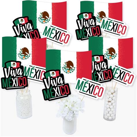 mexican flag decorations and candy sticks in vases