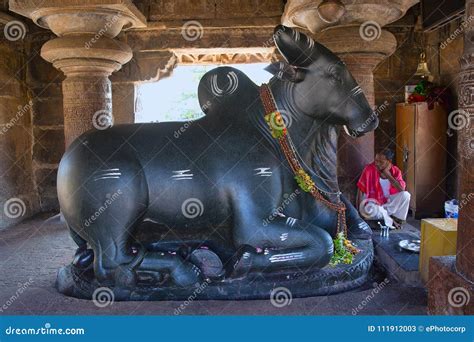 HAMPI, KARNATAKA, INDIA, NOVEMBER 2017, Hindu Priest or Pujari at Nandi Shrine Opposite ...