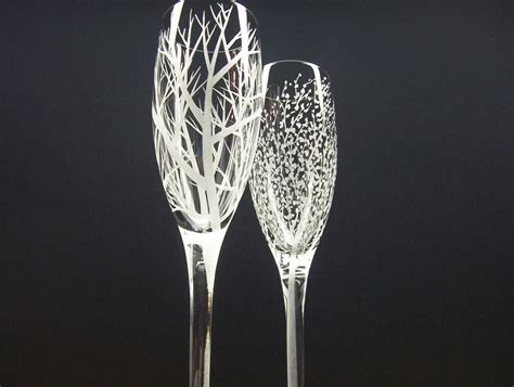 Two Hand Engraved Champagne Flutes . 'Reaching