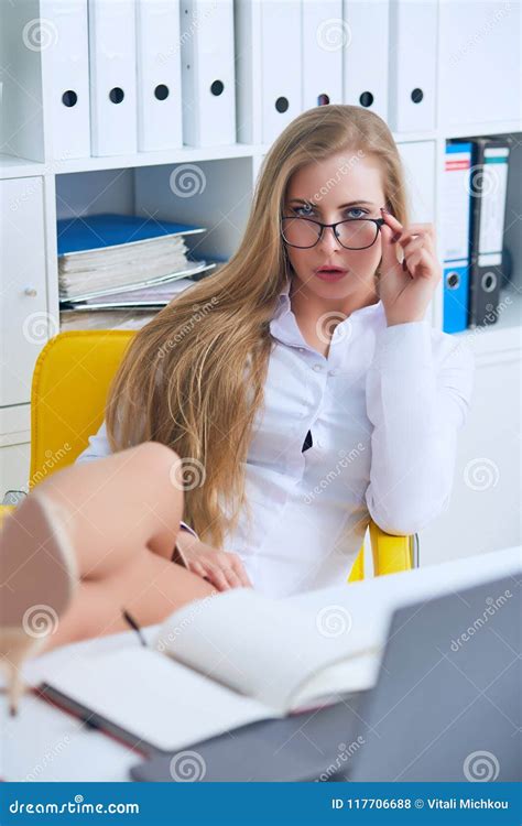 Office Flirt - Attractive Woman Flirting Over Desk with Her Coworker or Boss. Stock Photo ...