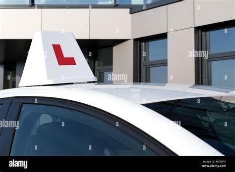 British driving school car roof sign Stock Photo - Alamy