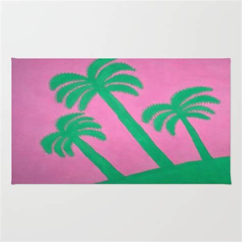 three palm trees against a pink background