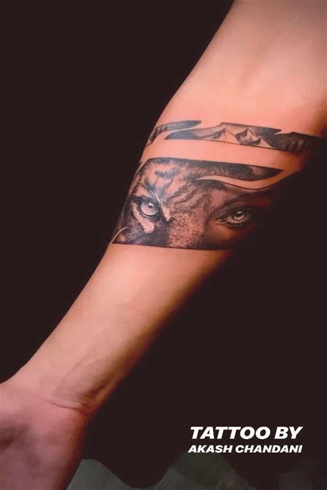 Tiger armband tattoo Tattoo by Akash Chandani | Forearm band tattoos ...