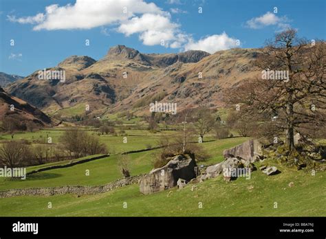 View down the Great Langdale Valley wih the Langdale Pikes in the background, Cumbria, England ...