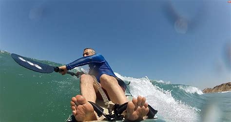 Surfing in Tel Aviv, Isreal. Small waves but fun enough to play with a ...