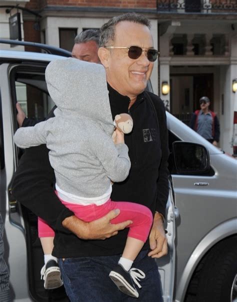 Tom Hanks Holds His Grandson Close | Celeb Baby Laundry