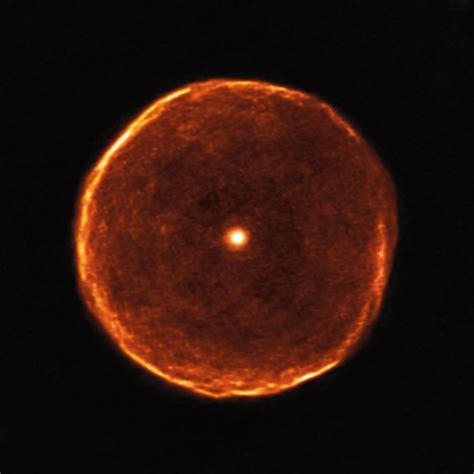 Glowing Red Eye: Cosmic Bubble Surrounds Odd 'Carbon Star' | Space