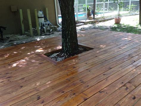 Our new, freshly stained deck. We used Olympic Elite Woodland Oil in the Mountain Cedar color ...