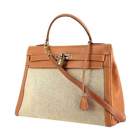 Hermès BAG HERMES MODEL KELLY CANVAS AND LEATHER Beige Cloth ref.109156 - Joli Closet