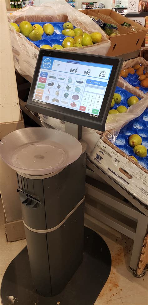 Grocery store scale that weighs produce and prints label in produce area to speed up checkout ...