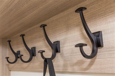 Oil rubbed hooks look great with any mudroom setup. Learn more here: https://www.closetfactory ...