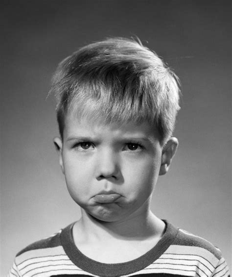 1950s portrait blond boy sad grumpy angry pouting facial expression ...