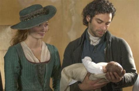 Poldark fans melt at the sight of rugged hero Aidan Turner cradling newborn son | Daily Mail Online