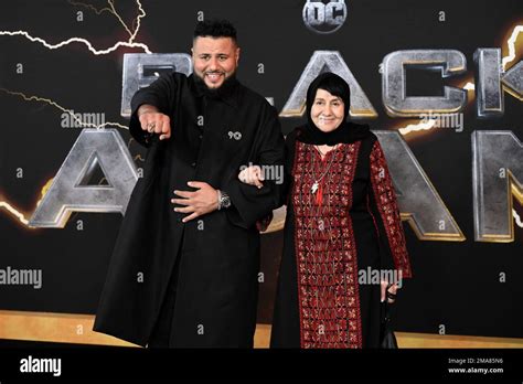 Mohammed Amer, left, and his mother attend the world premiere of "Black ...