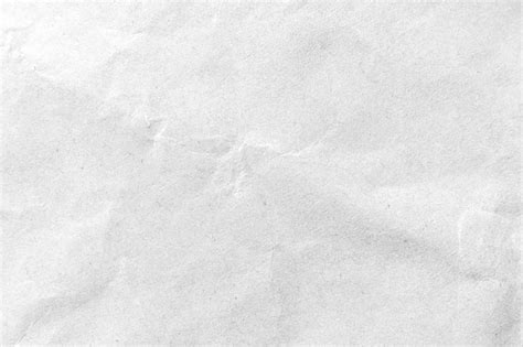 Premium Photo | White crumpled paper texture background. Close-up.