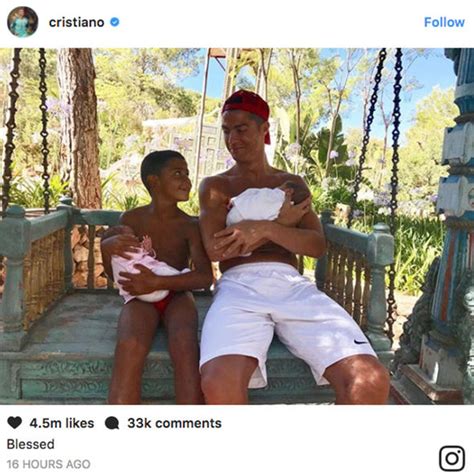 Cristiano Ronaldo and lookalike son cuddle up to newborn twins in ...