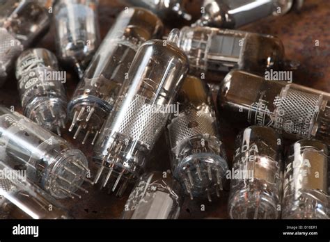 Pile of old used glass vacuum tubes used in radio and early tv crt ...