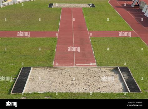 long jump pit Stock Photo - Alamy