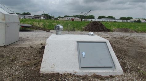 Below Ground Tornado Shelters - Garage Underground Storm Shelters