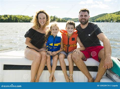 Family Out Boating Together Having Fun on Vacancy Stock Photo - Image of leisure, boat: 129239174