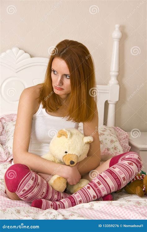 Sad teen on bed stock photo. Image of young, beauty, cute - 13359276