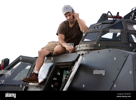 Storm Chaser and IMAX videographer Sean Casey sits on TIV during ...