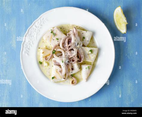 rustic mediterranean grill squid Stock Photo - Alamy