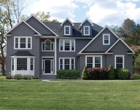 Grey Siding House With Black Windows - ABIEWWS