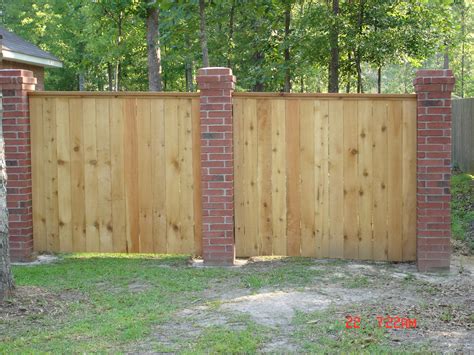 Brick Columns with Wood Fence | Brick fence, Brick columns, Wood fence